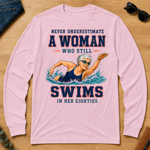 Never Underestimate A Woman Still Swims In Her 80s - light-pink - LST2D-LightPink