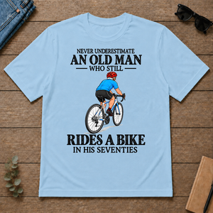 An Old Man Still Rides A Bike In His Seventies - light-blue - TS2D-LightBlue