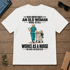 An Old Woman Still Works As A Nurse In Her 70s - white - TS2D-White