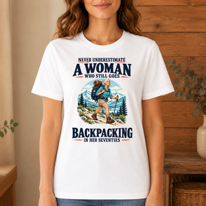 Never Underestimate A Woman Still Goes Backpacking - 4-TS2D-White