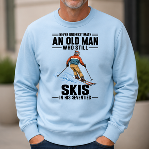Never Underestimate An Old Man Skis In His 70s - 6-CS2D-LightBlue