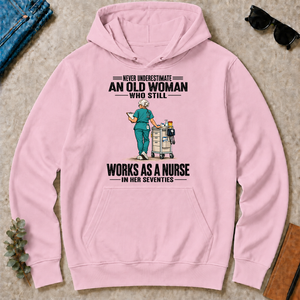 An Old Woman Still Works As A Nurse In Her 70s - light-pink - HS2D-LightPink