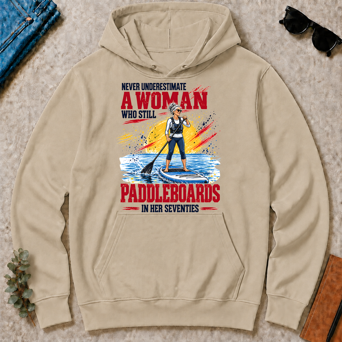 A Woman Still Paddleboards In Her 70s - sand - HS2D-Sand