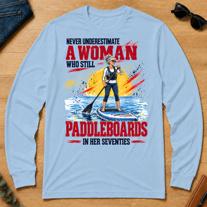 A Woman Still Paddleboards In Her 70s - light-blue - LST2D-LightBlue