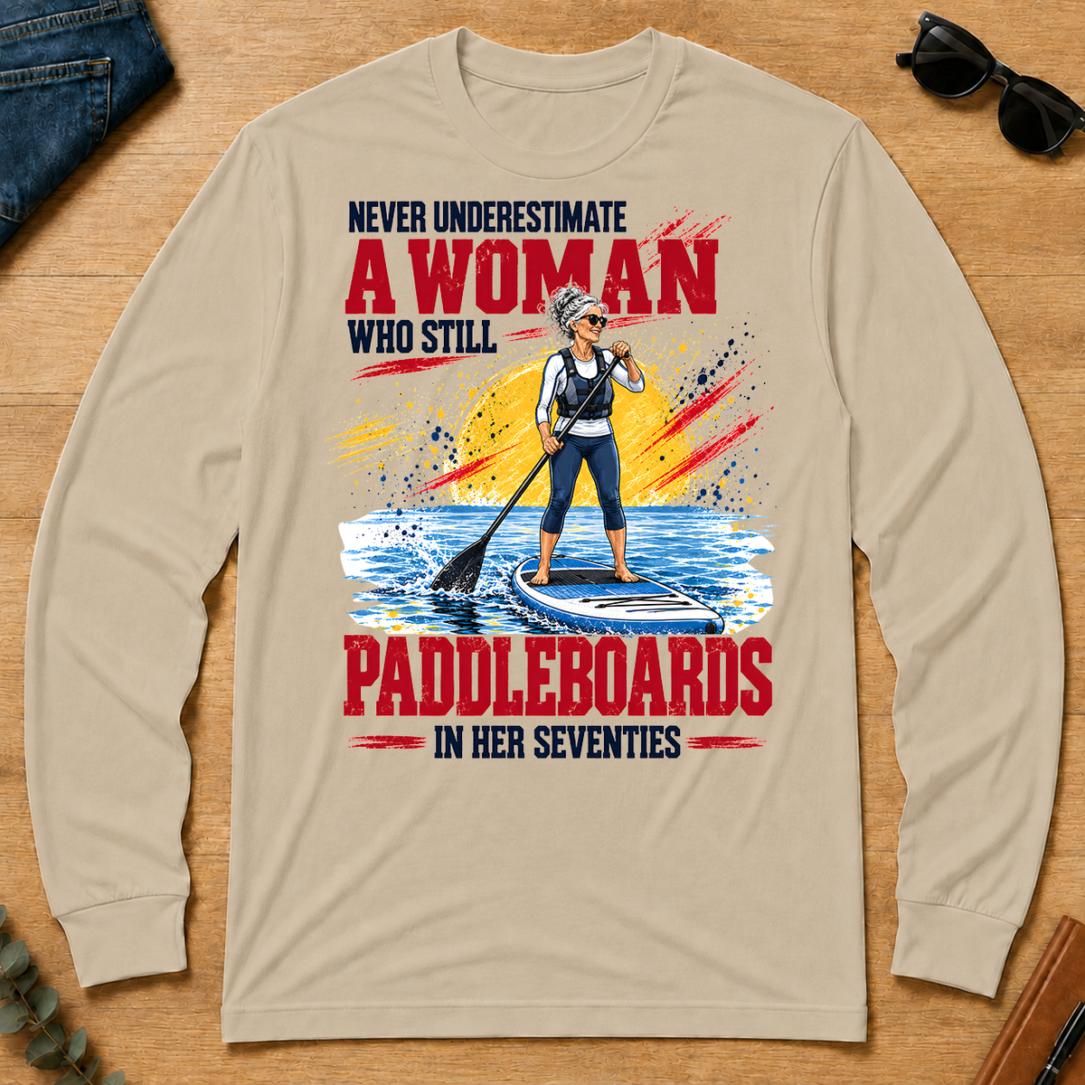 A Woman Still Paddleboards In Her 70s - sand - LST2D-Sand