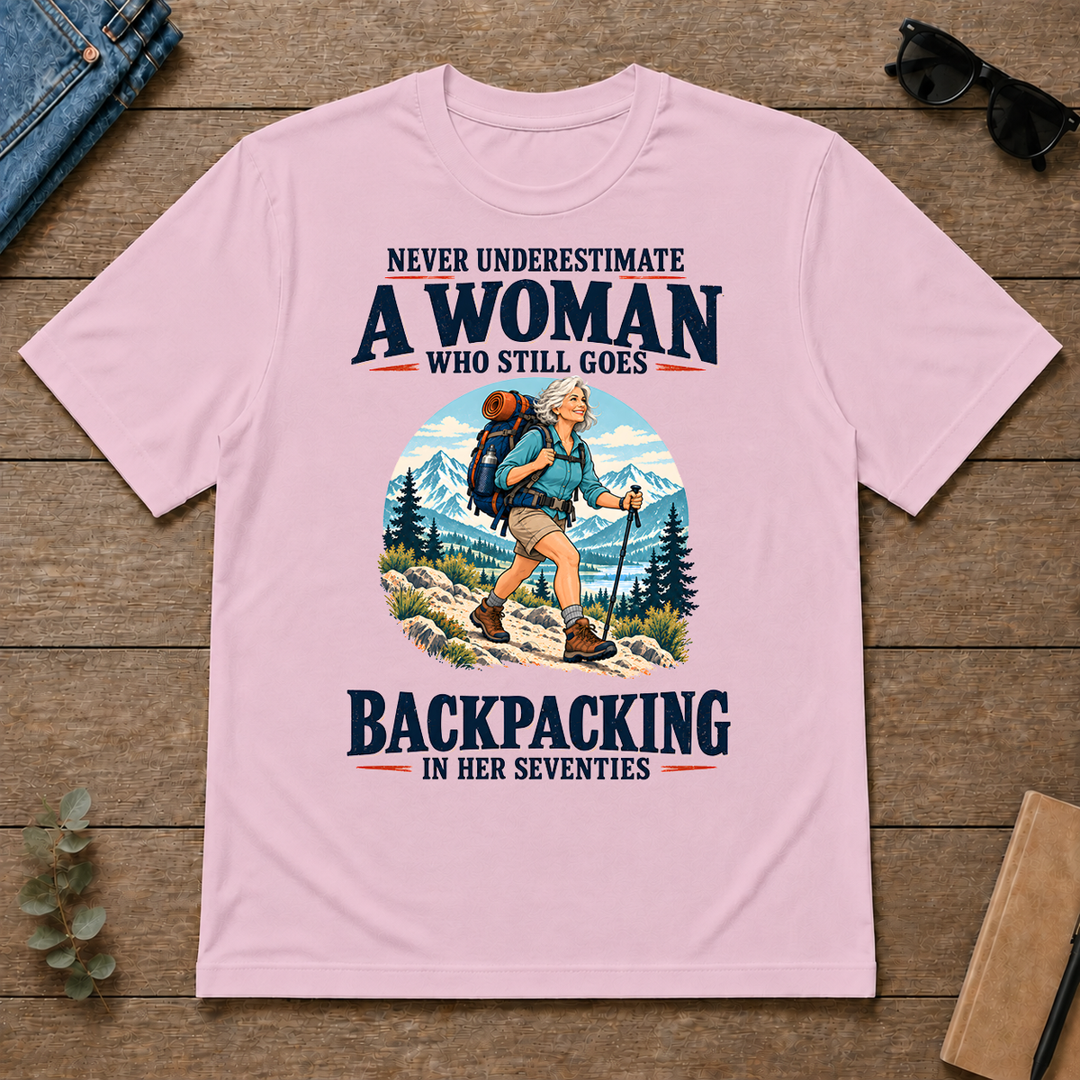 Never Underestimate A Woman Still Goes Backpacking - light-pink - TS2D-LightPink